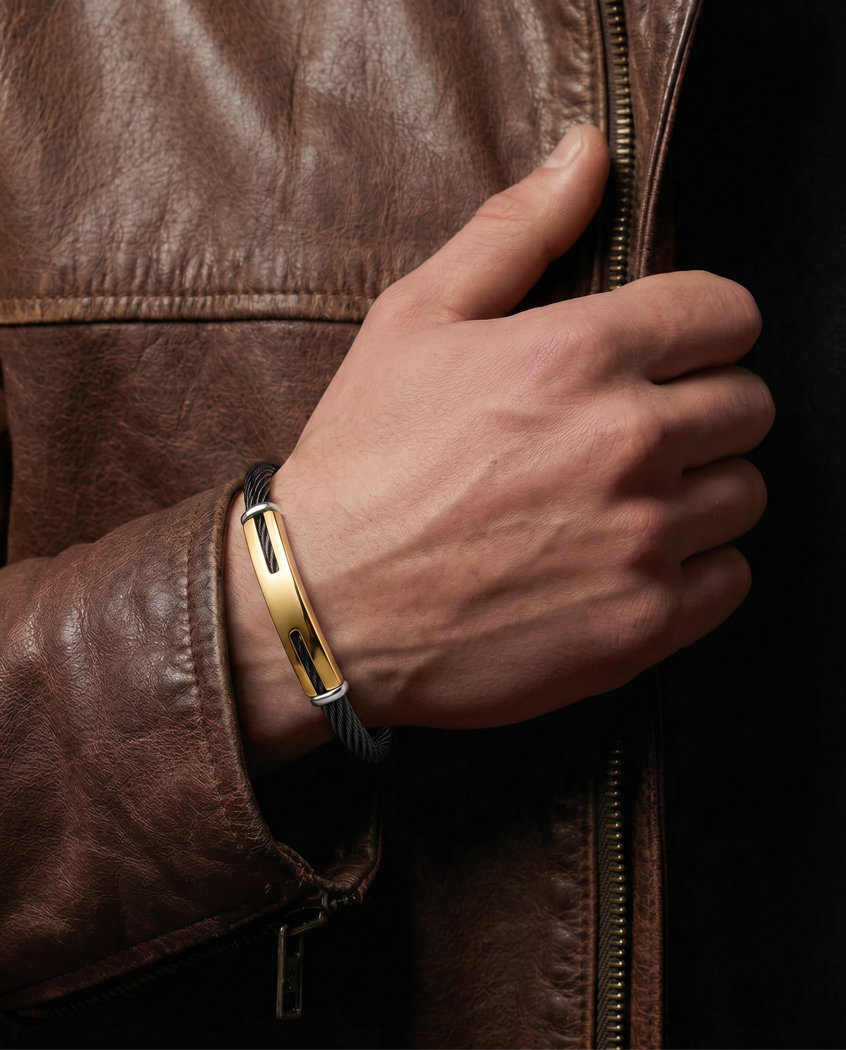 Close-up of black leather and steel bracelet