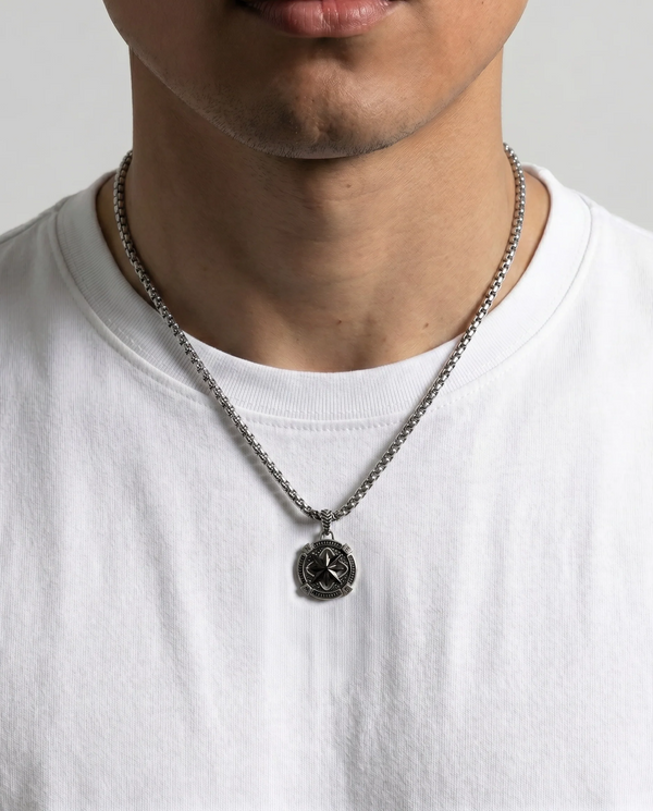 Men's black compass pendant by