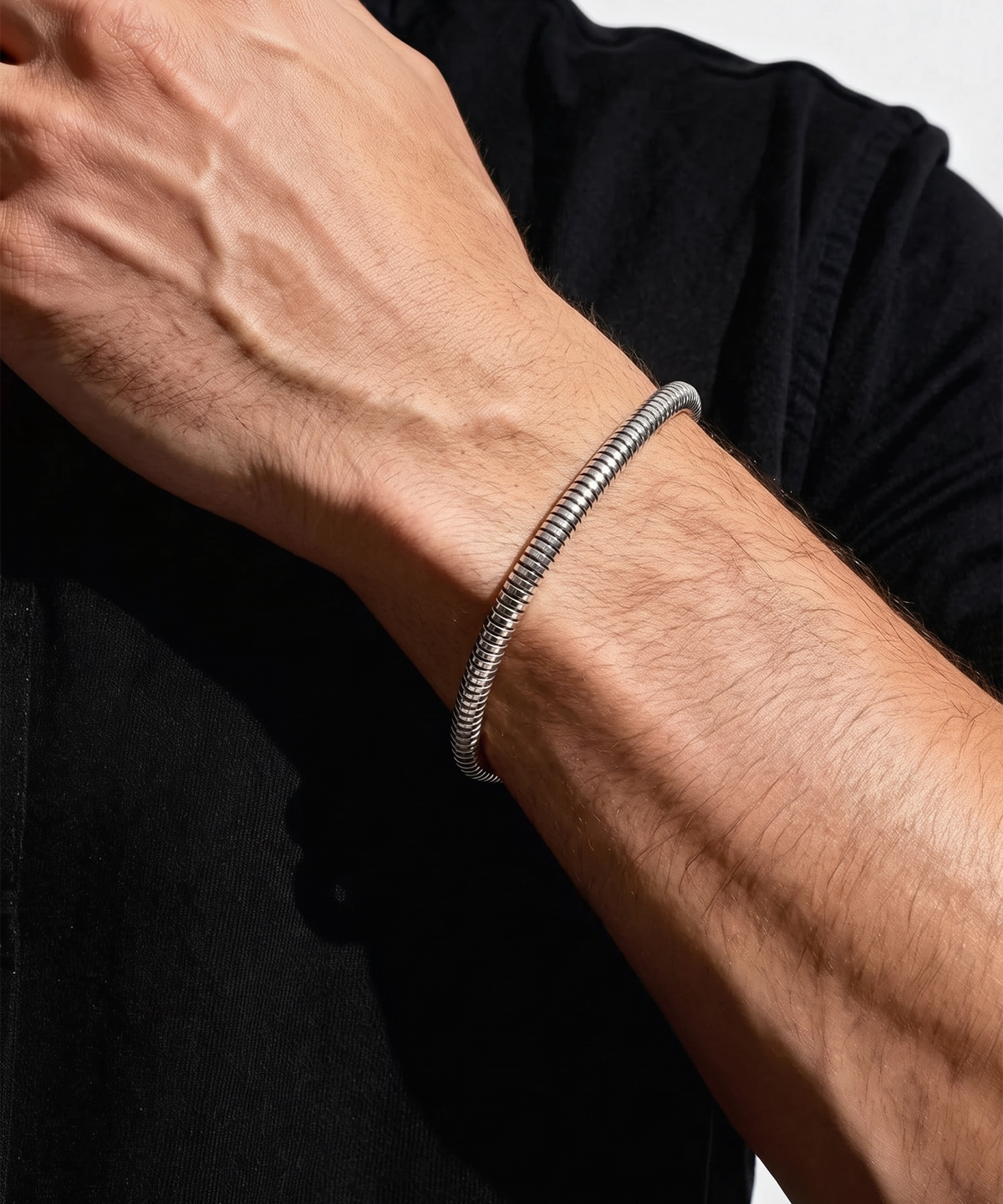Close-up of snake chain bracelet