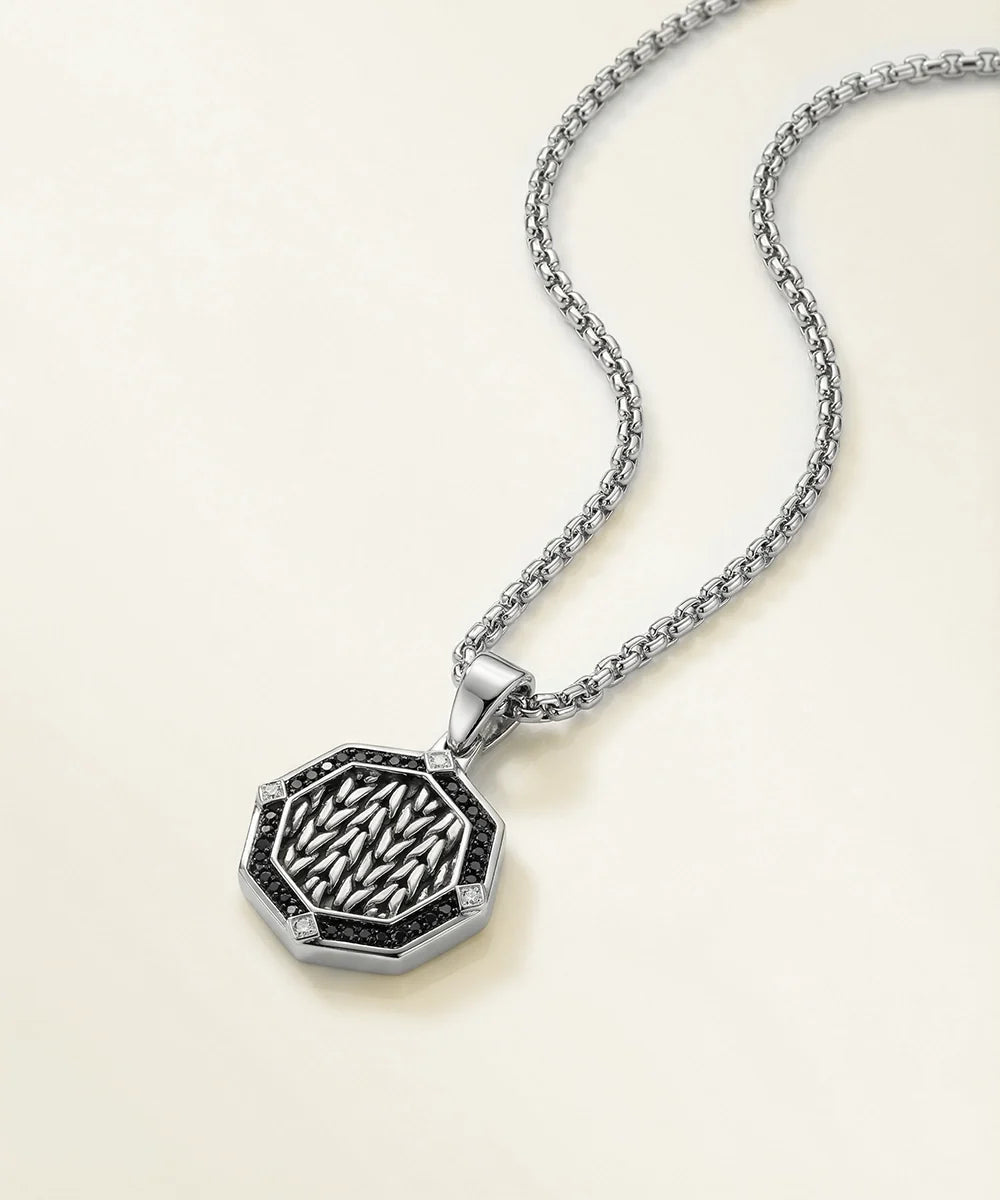 men's black medallion pendant from Valliani Jewelers