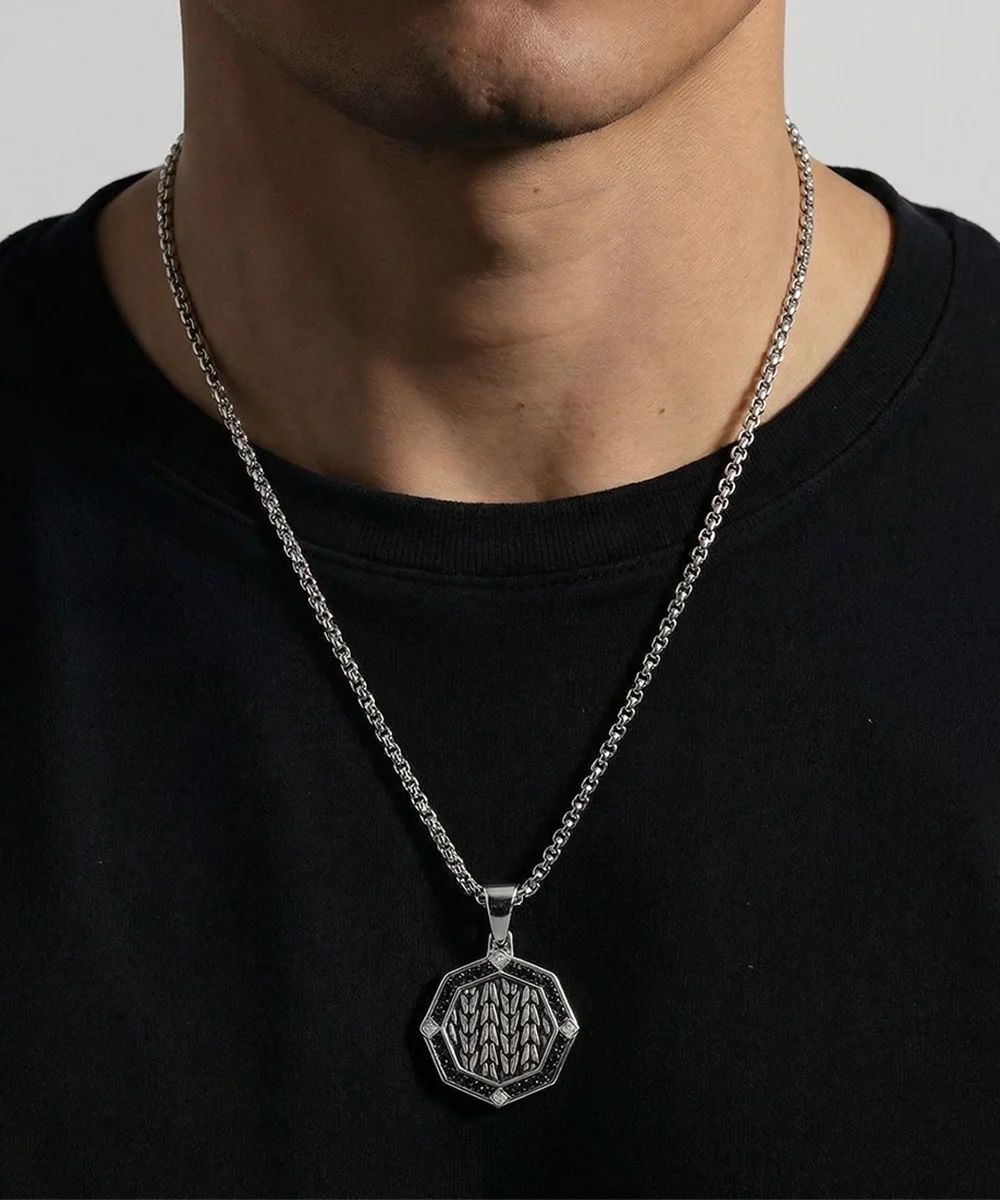 Close-up of black cubic zirconia medallion