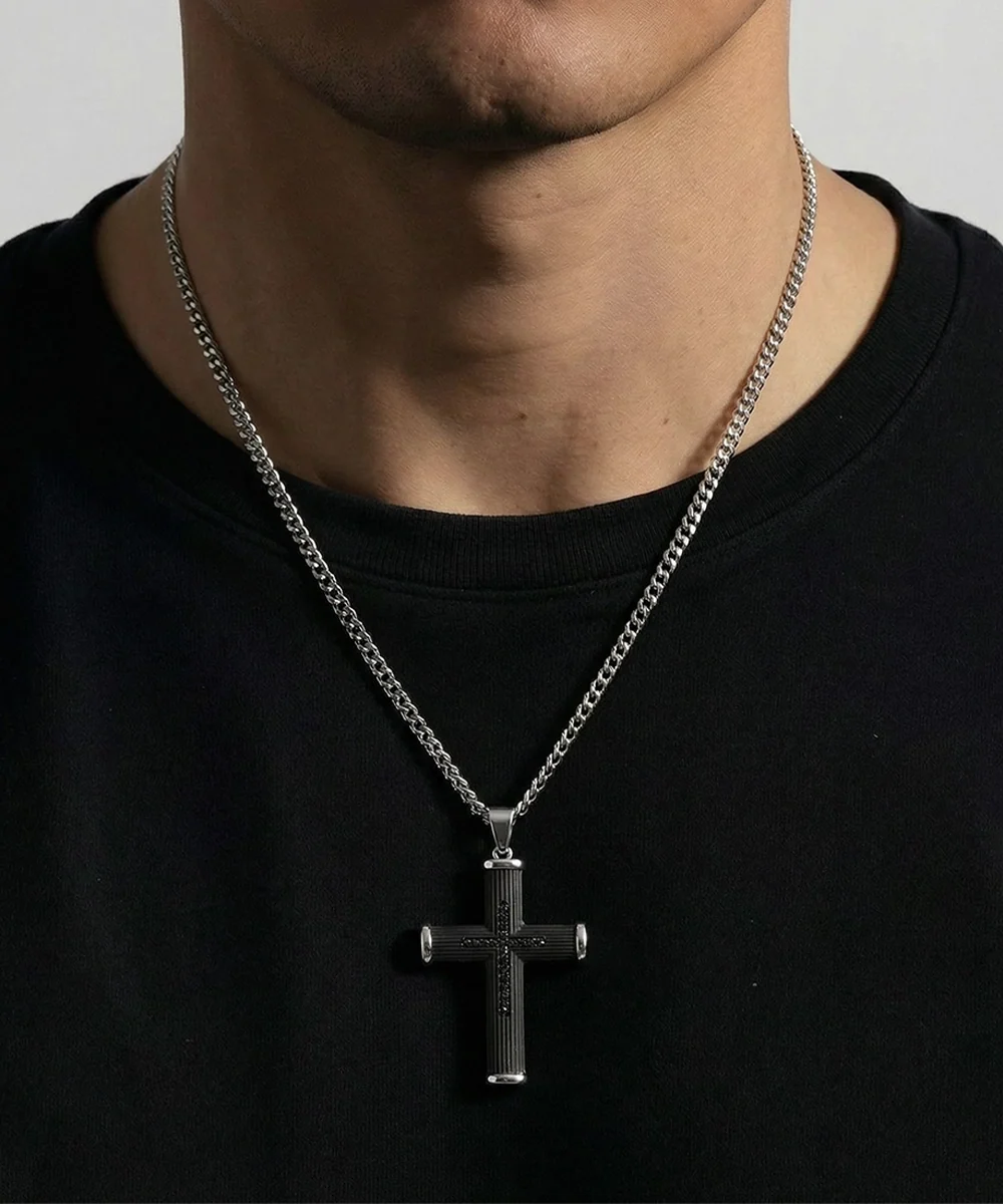 Close-up of black cubic zirconia cross pendant