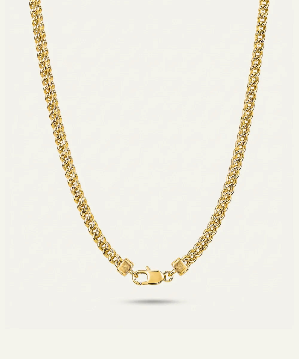 Close-up of men's gold Franco chain featuring interlocking square weave links