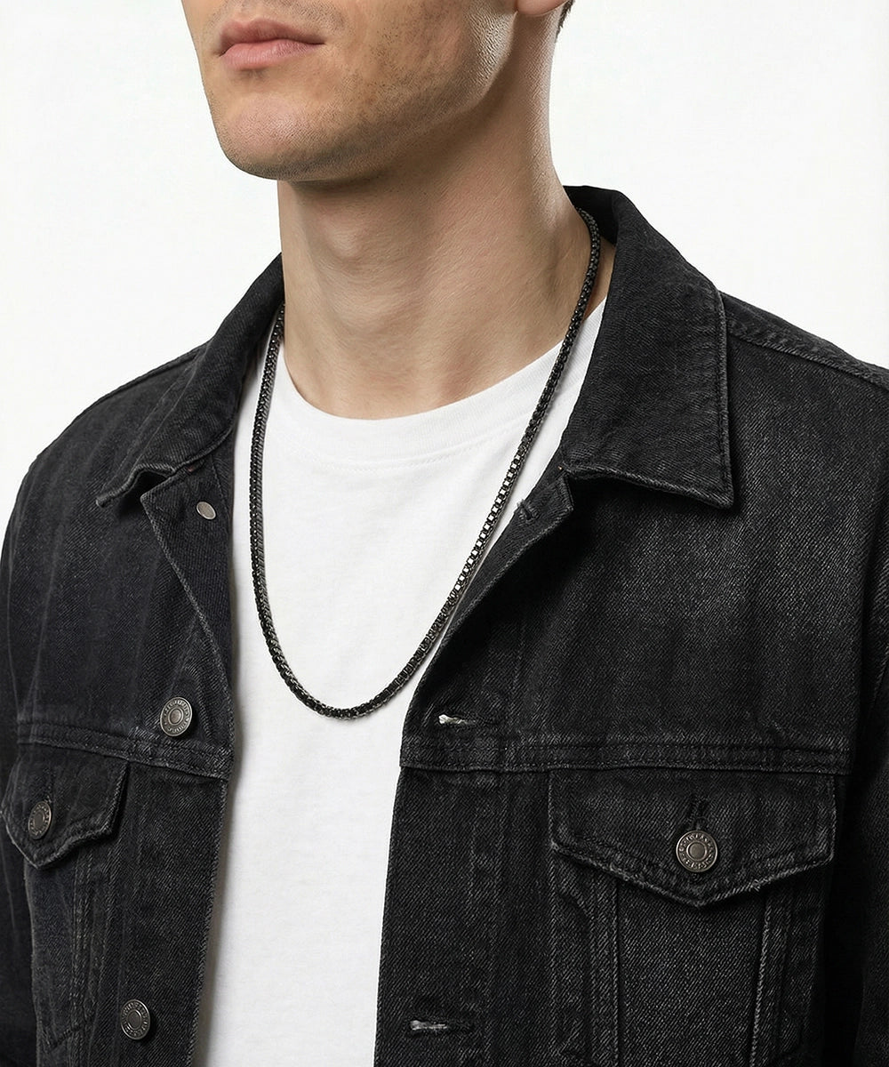Close-up of black tennis necklace