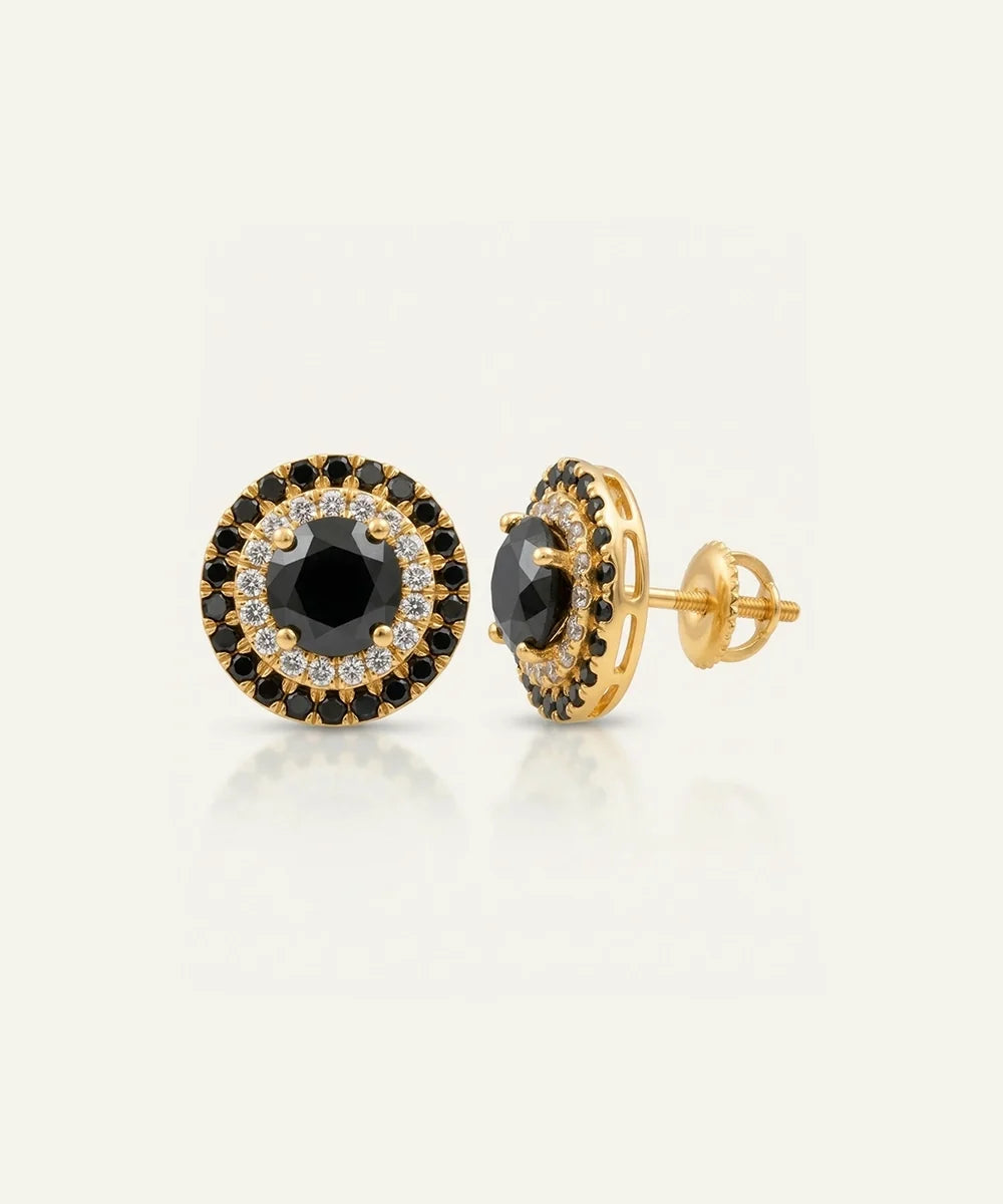Close-up of men's black diamond cluster earrings in vermeil