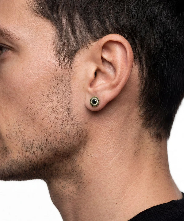 Side view of vermeil black diamond stud earrings