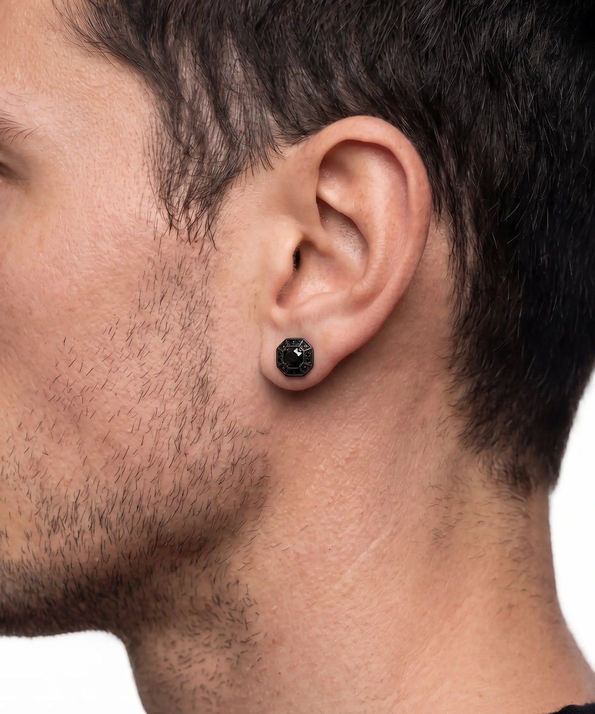 Side view of black diamond stud earrings