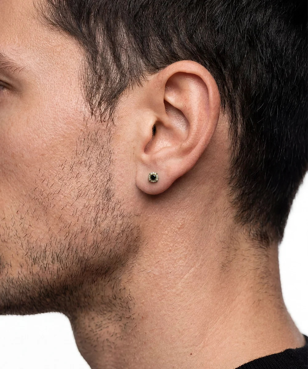 Close-up of black diamond cluster studs