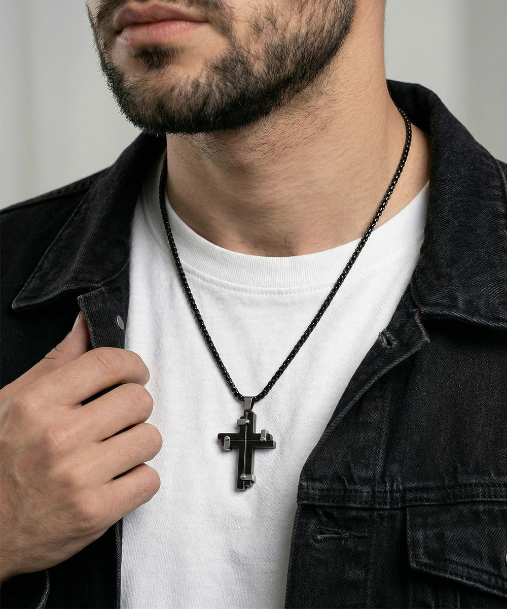 Close-up of screwed-in cross pendant